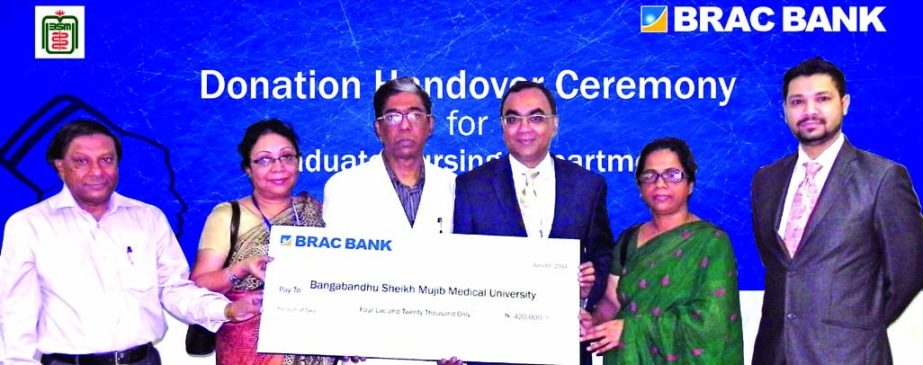 Syed Mahbubur Rahman, Managing Director of BRAC Bank Limited, handing over a cheque of Tk 4.20 lakh to Prof Dr Pran Gopal Dutta, Vice Chancellor of BSMMU for facilitating higher education in nursing at the university premises on Monday.