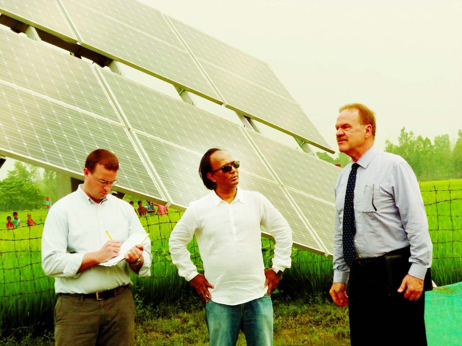 US Ambassador Den W Mozena visiting Baliadanghi village of Bogra to see solar pump using for irrigation on Wednesday. Dr Mostaq Ahmmed, Managing Director of Green Housing and Energy Ltd seen with him.