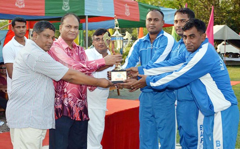 Assistant Chief of Air Staff Air Vice Marshal M Mazharul Islam giving away the Champion Trophy to BAF Base Zahurul Haque team who emerged as champions in the Inter-Base Volleyball Championship of Bangladesh Air Force concluded at BAF Base Pahar Kanchanpur