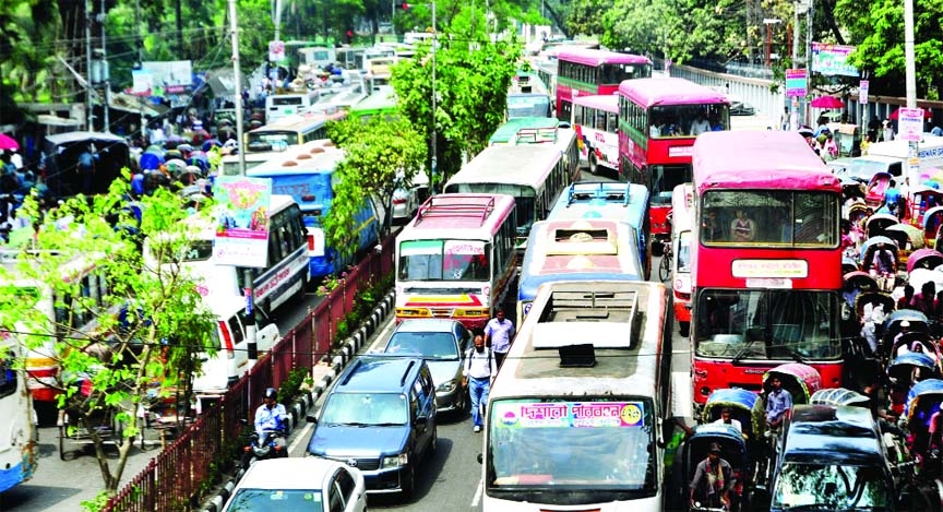Massive traffic jam a regular feature in the capital. This photo was taken from near Jatiya Press Club on Thursday.