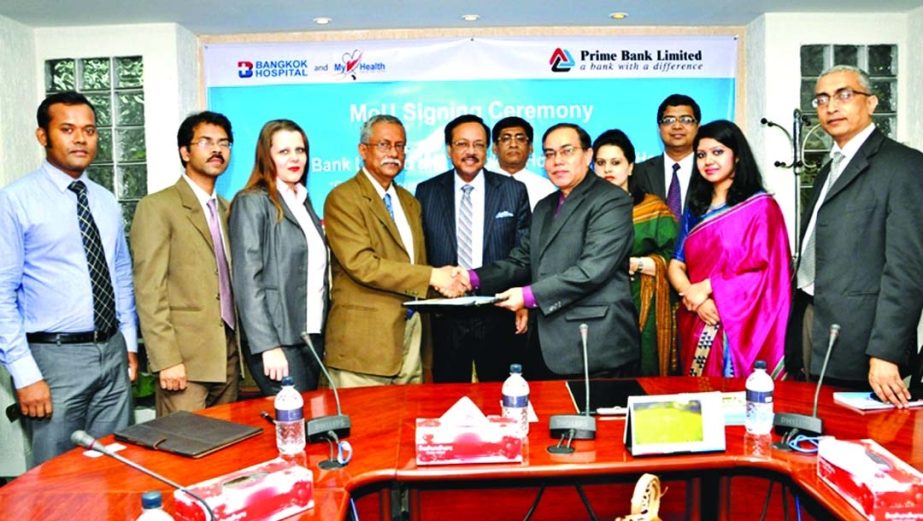 Deputy Managing Director and Head of Emerging Market of Prime Bank Limited Habibur Rahman and Managing Director of My Health Dr Nilanjon Sen sign a Memorandum of Understanding at the bank's head office on Wednesday to facilitate premium customers of Prim