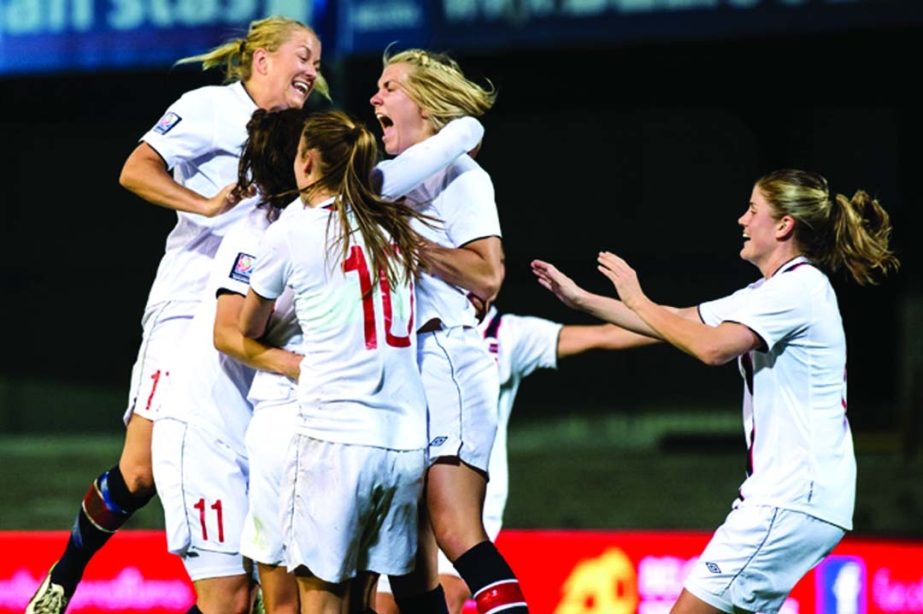 Norway players celebrate after Ingvild Stensland scored during the Women's World Cup Group 5 qualifying match against Belgium, in Leuven, Belgium on Thursday.