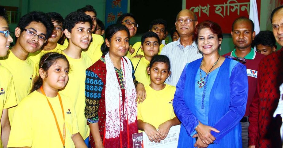 Photo shows Education Minister Nurul Islam Nahid with the participants of Dhaka Metropolis School Table Tennis Competition at the Shaheed Tajuddin Ahmed Indoor Stadium in the city on Saturday.