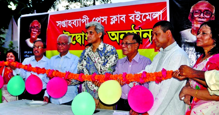 Educationist Prof Sirajul Islam inaugurating a week-long 'Press Club Book Fair' at the National Press Club in the city on Sunday.