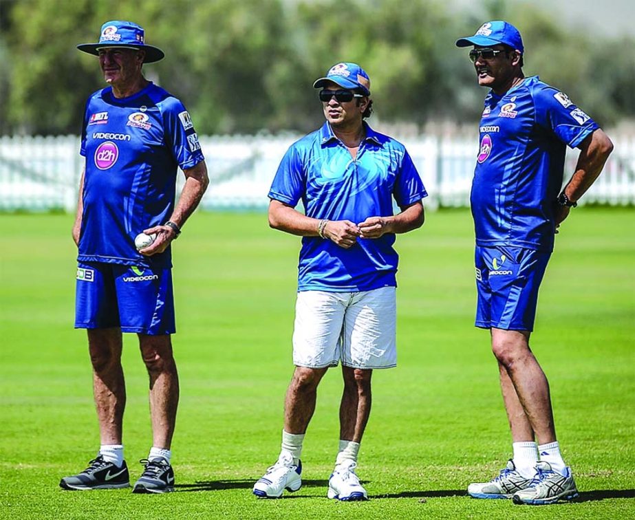 John Wright, Sachin Tendulkar and Anil Kumble at the Mumbai Indians' net at Abu Dhabi on Tuesday.