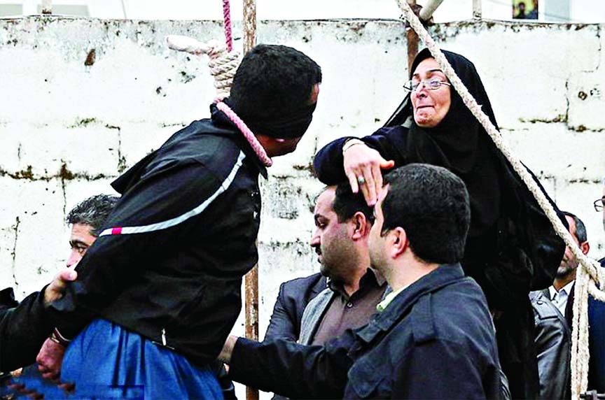 An Iranian killer is slapped around the face by the victim's mother as he prepares to be hanged... but in an extraordinary act of clemency she chooses to let him walk free.