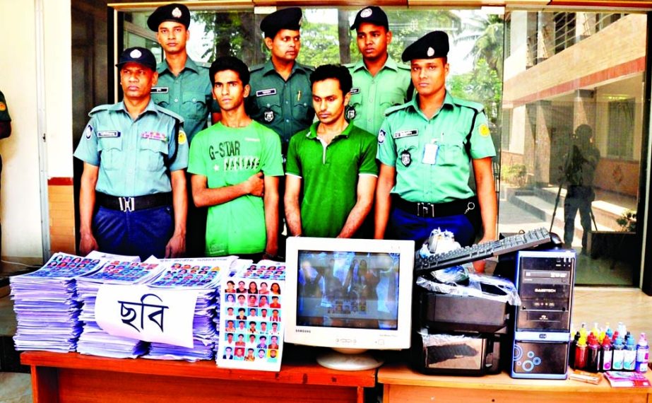 Two persons along with 53000 fake National Identity (NID) cards and coloured pictures were arrested by the law enforcers from Dholaipar and Gazipur areas in the city on Saturday.
