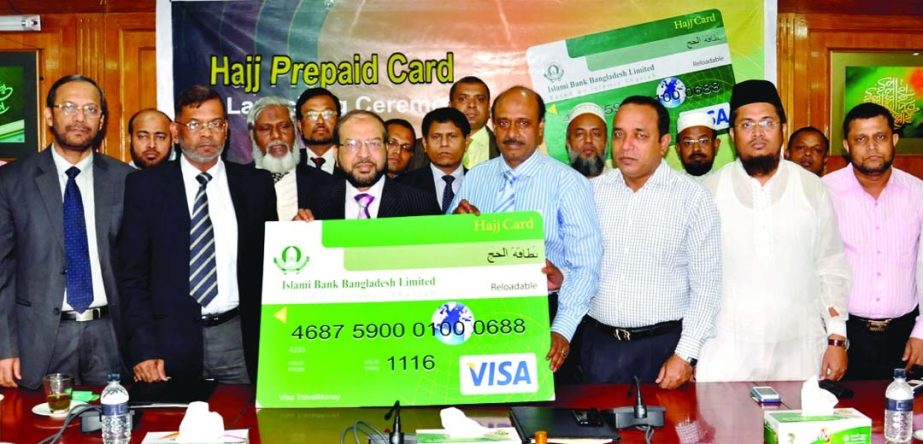 Mohammad Abdul Mannan, Managing Director of Islami Bank Bangladesh Limited, unveils the newly introduced Hajj Prepaid Card at Board Room of Islami Bank Tower on Sunday. Pilgrims can bear the permitted US Dollar and Saudi Rial with the card and withdraw th