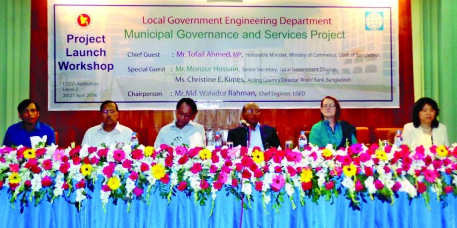 Commerce Minister Tofail Ahmed inaugurating a two-day long workshop on "Municipal Governance and Services Project of LGED at LGED Bhaban on Sunday. Monzur Hossain, Sr Secretary of LGD, Christine E Kimes, Acting Country Director of World Bank, Md Wahidur