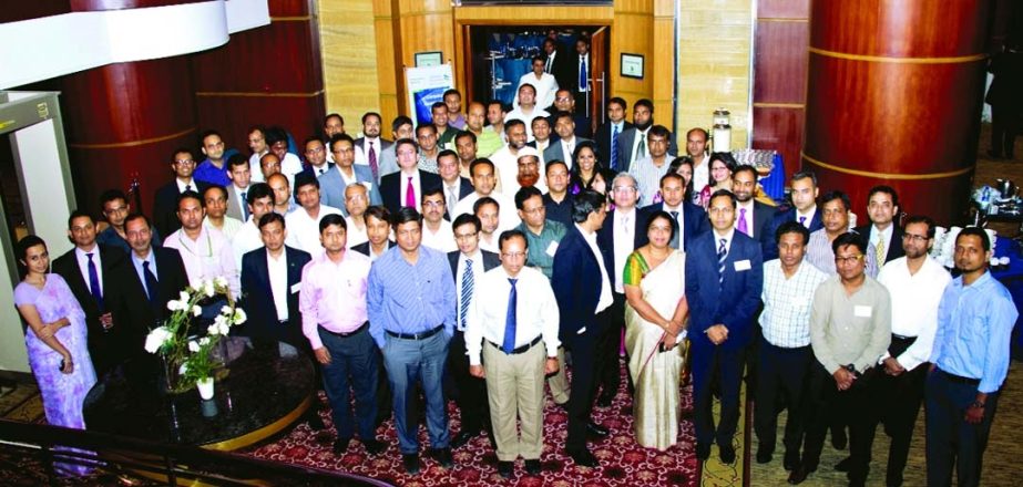 Gautam Jain, Global Head, Client Access, Ambika Ravi, Head of Products, South Asia and Hussain Shirazie, Head of Transaction Banking, Standard Chartered Bank of Bangladesh along with the participants of a seminar "Effective Working Capital Management Lev