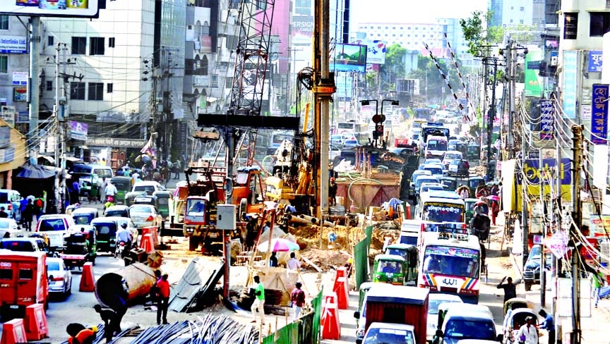 Staggering construction work for new flyover coupled with unending movement of vehicles from Bangla Motor to Mouchak through Boro Moghbazar intersection has turned the areas into city of chaos. Besides, other hazards made the lives of commuters unbearable