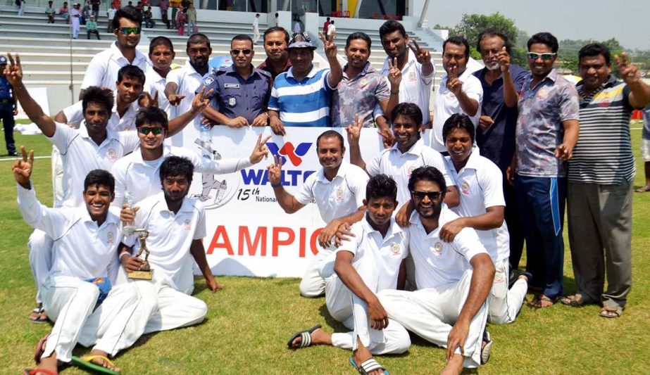 Members of Dhaka Division celebrate after beating Khulna Division to clinch the title of the Walton National Cricket League at Sheikh Kamal International Cricket Stadium in Cox's Bazar on Tuesday.