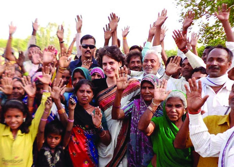 Priyanka Vadra addresses village women during her election campaign.