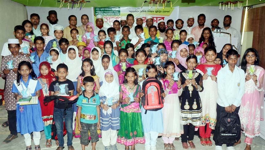 Shaheed Halim-Liakat Smriti Foundation arranged an examination for the scholarship in Chittagong recently. Teachers are seen with the successful students.