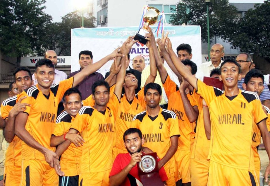 Members of Narail DSA, the champions of the Walton Smart Television Inter-District Volleyball Competition pose for a photograph at the Volleyball Stadium on Thursday.