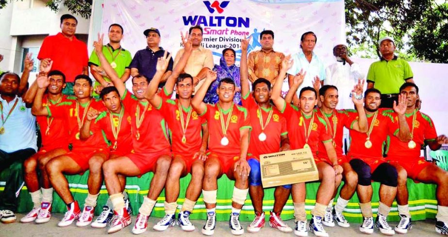 Players of Bangladesh Army, who became champion of Premier Kabaddi pose with guests and officials at the kabaddi ground on Friday.