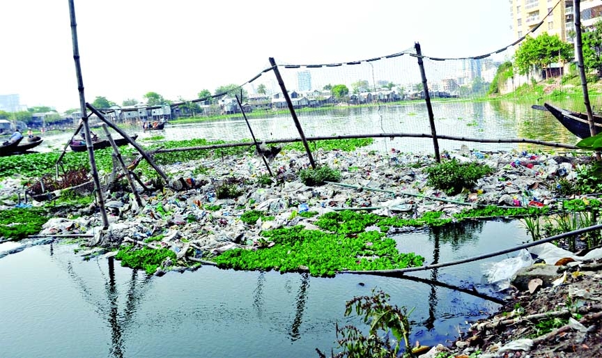 Once the scenic beauty spot, the Gulshan Lake-1, turned into a regular dumping ground of waste and garbage. Authorities yet to take care about it. This photo was taken on Friday .