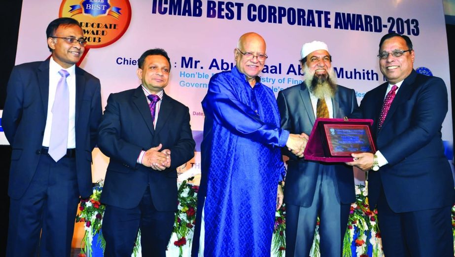 Helal Ahmed Chowdhury, Managing Director & CEO of Pubali Bank Limited receiving "Certificate of Merit" award in the Private Commercial Bank category by the Institute of Cost and Management Accountants of Bangladesh from Finance Minister Abul Maal Abdul