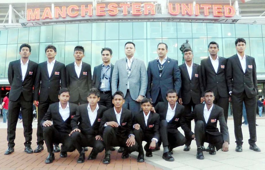 The selected Airtel Rising Stars with Managing Director of Amber Group Shawkat Aziz Russell pose for a photograph at the Manchester United Stadium in London on Tuesday.