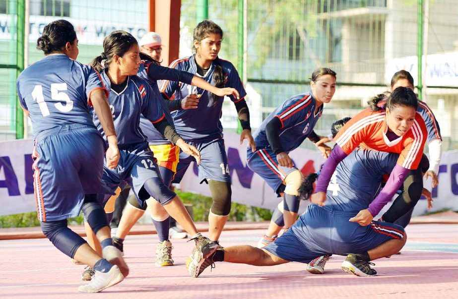 A moment of the match of Marcel LED Television Inter-Divisional Women's Kabaddi Competition between Narail DSA and Jamalpur DSA at the Kabaddi Stadium on Tuesday.