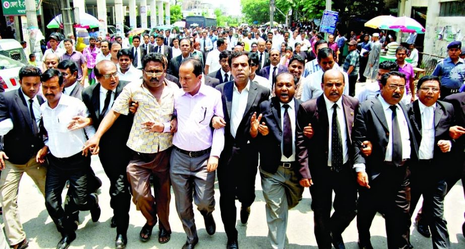 Lawyers of N'ganj demonstrating outside the court premises on Tuesday demanding rescue of Advocate Chandan Sarker abducted along with 7 others on Monday.