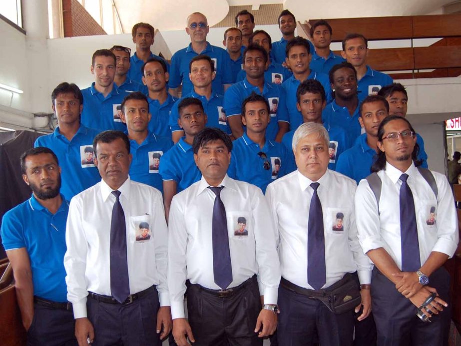 Members of Sheikh Russel Krira Chakra pose for a photo session at the Shahjalal International Airport on Sunday before leaving the city for Colombo to take part in the AFC President's Cup Football Competition scheduled to be held in Colombo from tomorrow