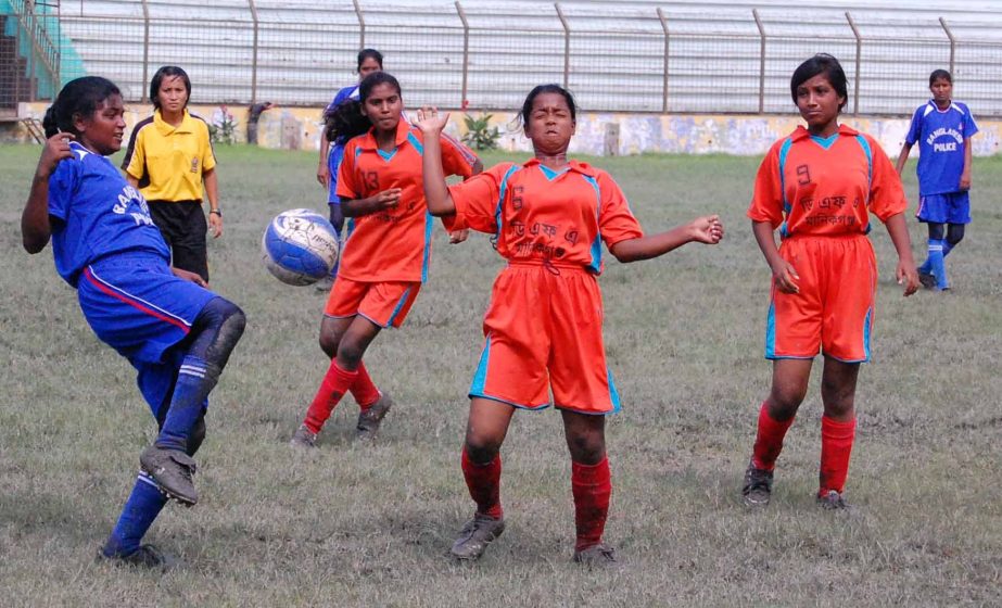 A view of the match of KFC National Women's Football Championship between Lalmonirhat District team and Rangpur District team at the Dinajpur District Football Stadium on Sunday.