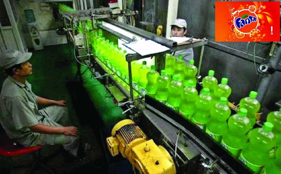 Employees work at a Fanta production line at the Coca Cola plant in Nanjing, Jiangsu province, July 29, 2008.