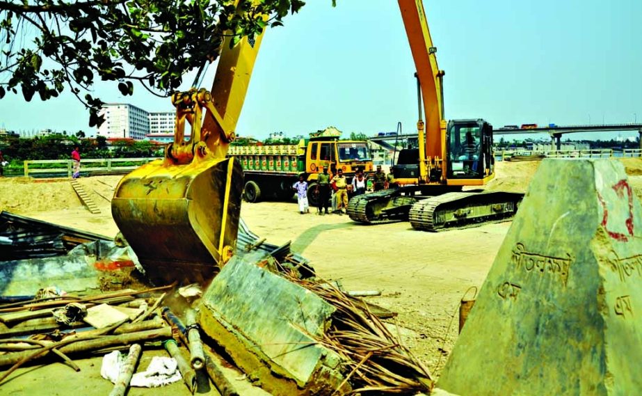 Prime accused of 7 abducted murders at N'ganj, Nur Hossain's sand trading structures on the bank of the Shitalakkhya River being evicted by BIWTA authorities on Tuesday.