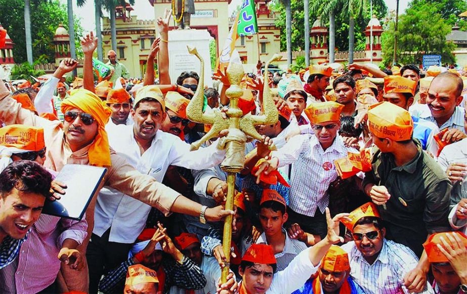 BJP activists stage a protest dharna against the Election Commission near the BHU at Lanka in Varanasi.