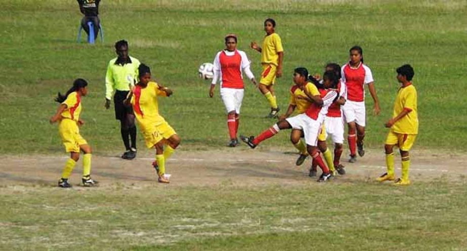 A scene from the football match of the Super League of the KFC National Women's Football League between Narail District team and Madaripur District team at the Bagerhat District Stadium on Thursday. Narail won the match 2-0.