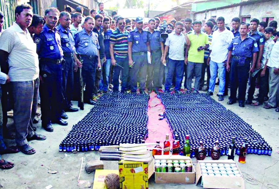 Police in a raid recovered huge quantity of phensidyl, foreign liquor, yaba tablets and huge sharp weapons from 5 shops of Nur Hossain at Shimrail truck stand in city's Siddhirganj area on Friday.