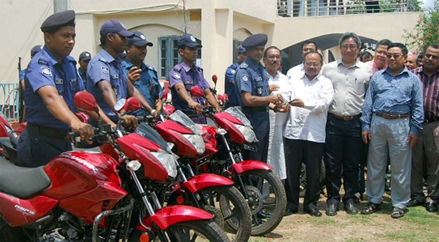 Kuzendra Lal Tripura, MP of Khagrachari seen handing over 25 motor cycles to Khagrachari SP at a function on Monday.