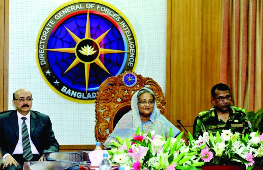 Prime Minister Sheikh Hasina speaking at a meeting with the high officials of Directorate General of Forces Intelligence (DGFI) when she visited there in Dhaka Cantonment on Wednesday. BSS photo