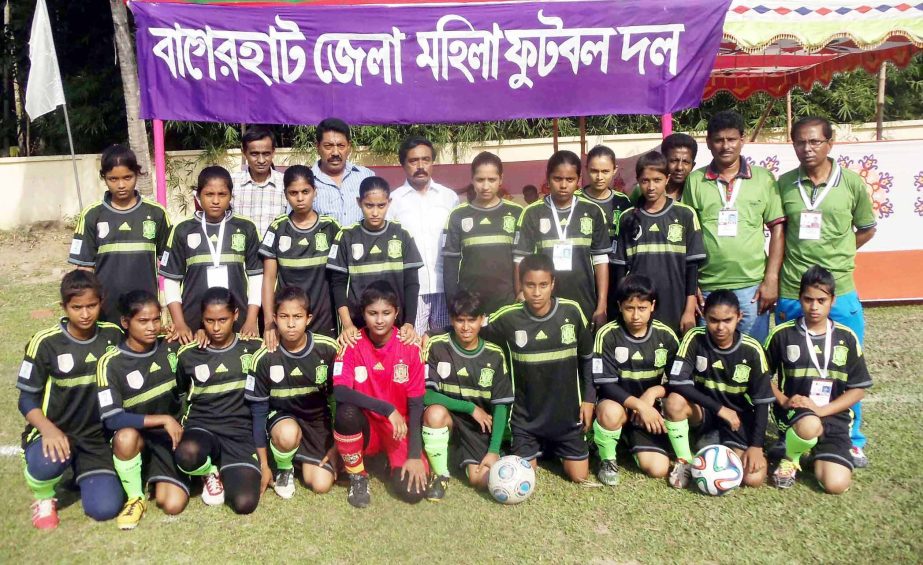 Members of Bagerhat District Women's Football team, the champions of Bagerhat Zone of the KFC National Women's Football Tournament pose for a photograph after defeating Narail District Women's Football team by 8-0 goals in the final at the Bagerhat Dis