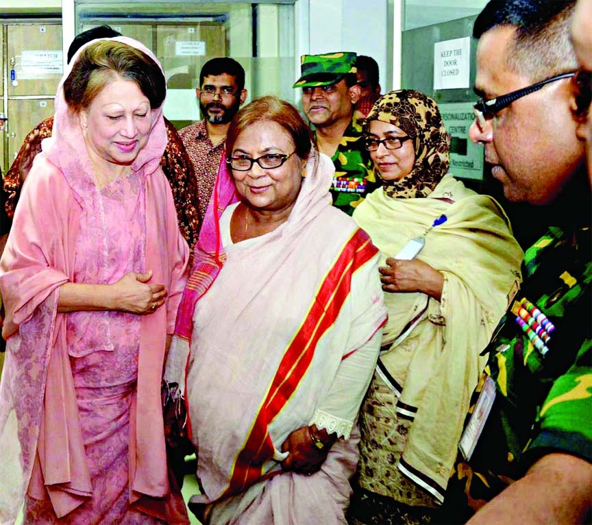 BNP Chairperson Begum Khaleda Zia went to the Passport Office in city's Agargaon to complete official procedure for her new Machine Readable Passport (MRP) on Thursday.