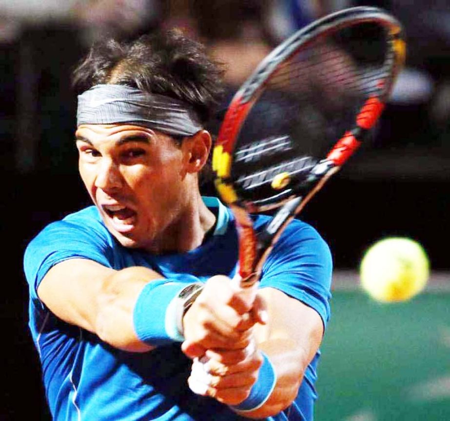 Spain's Rafael Nadal returns a backhand to Britain's Andy Murray during their match at the Italian open tennis tournament in Rome on Friday.