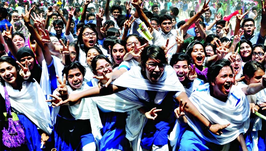 Students of Motijheel Ideal School celebrating their schoolâ€™s obtaining second position in SSC examination in Dhaka Board on Saturday.
