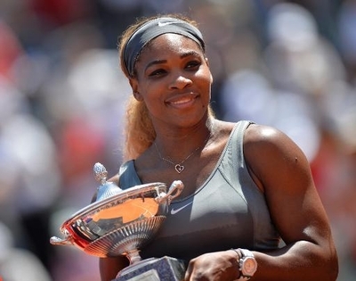 Serena Williams holds the trophy after winning the WTA Rome Masters final against Sara Errani on Sunday.