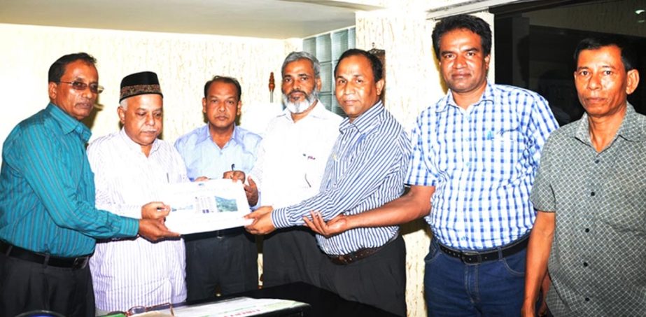 Board officials handing over SSC results to CCC Mayor M Monzoor Alam on Saturday.