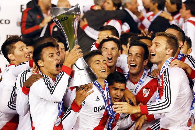River Plate's players celebrate on the podium after winning the Argentina's league soccer championship in Buenos Aires, Argentina on Sunday.