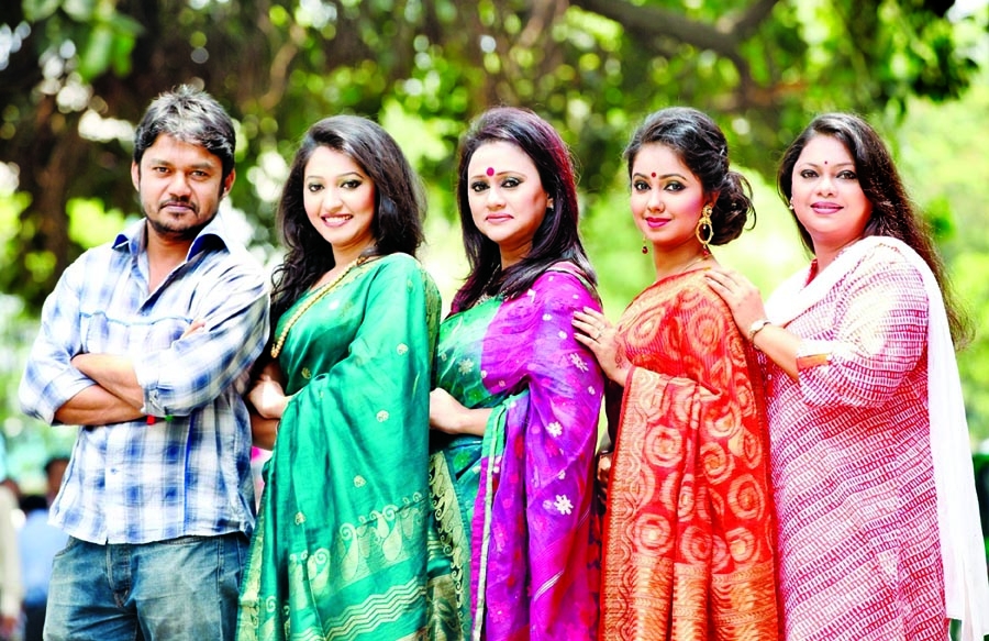 Producer Ananya Ruma along with her assistant producer and three hosts of Citycell Taroka Kothon at a photo session on Tuesday