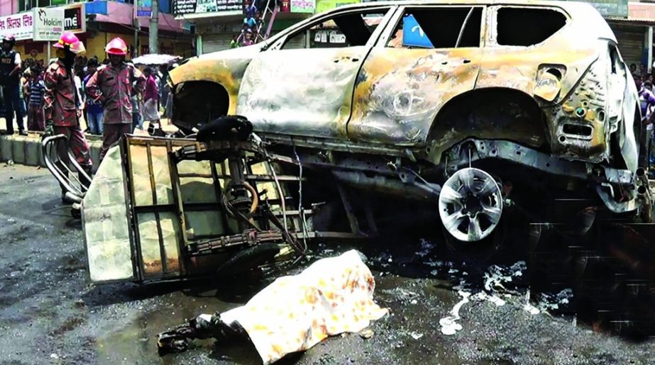 The charred body of Fulgazi Upazila Chairman Ekramul Haque Ekram and his torched car were lying on open space soon after the attack by the miscreants on Tuesday.