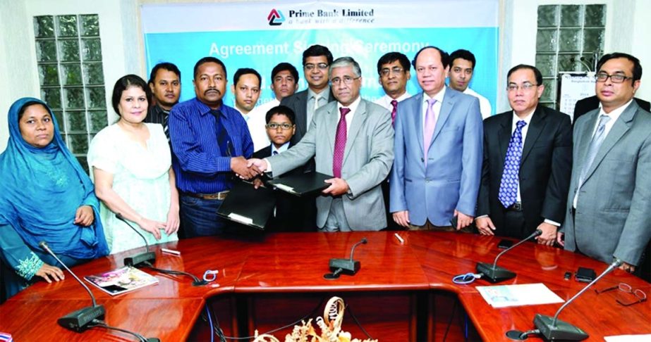 Managing Director (current charge) of Prime Bank Ahmed Kamal Khan Chowdhury and Md Fahad Rahman, youngest Fide Master of the world, sign an agreement at head office of the bank on Thursday. Under the agreement Fahad Rahman appointed as Brand Ambassador o