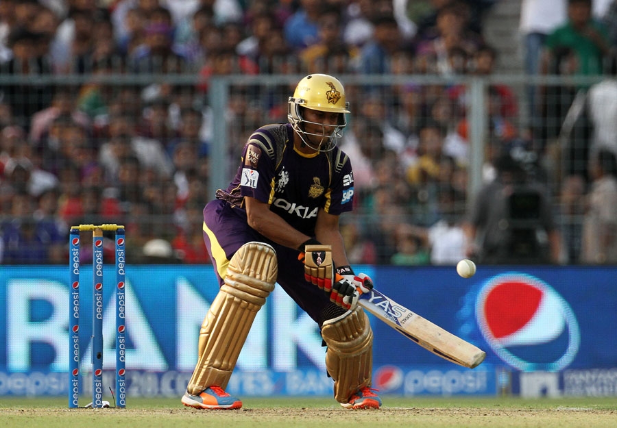 Shakib Al Hasan attempts a scoop during the IPL 2014 match between Kolkata Knight Riders and Royal Challengers Bangalore in Kolkata on Thursday.