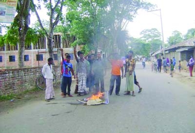 FENI: People protested killing of Fulgazi Upazila chairman Ekram blocking highway in Feni yesterday.