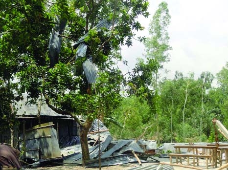 SHERPUR(Bogra): Kolyani Girls' Dakhail Madrasa at Sherpur Upazila was damaged by Nor'wester on Friday.