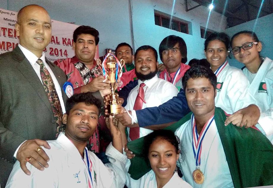 Members of Bangladesh Karate team, the runners-up of NSKA International Martial Art Karate Championship with Additional Director of Walton FM Iqbal Bin Anwar pose for a photo session in Nepal on Saturday.