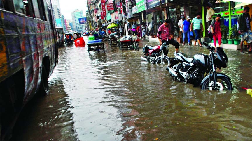 Sunday's rain water remains stagnant for several hours in city's Mouchak area due to inadequate drainage system leading to immense sufferings to commuters.