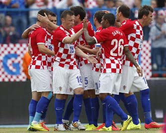 Croatia players celebrate their goal during the international friendly soccer match between Croatia and Mali, in Osijek, Croatia on Saturday.